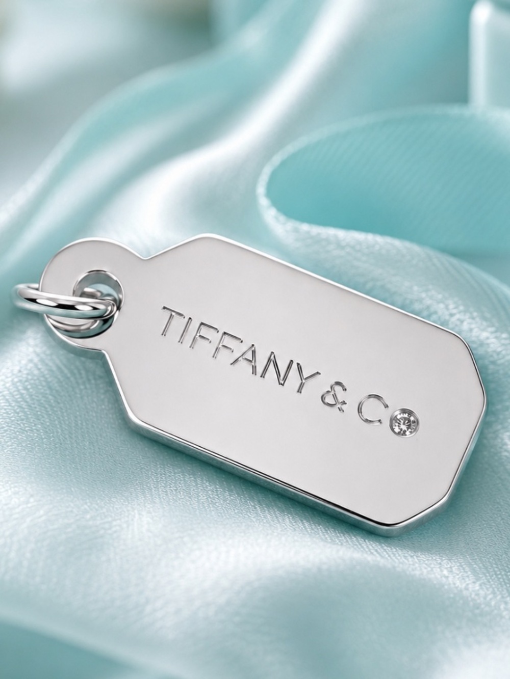 Tiffany & Co. Diamond Logo Tag retired 925 silver Charm New in Box